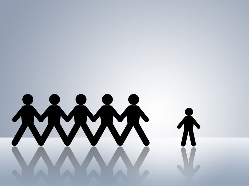 Silhouette of a person with dwarfism standing next to a group of people of average height Silhouette of a person with dwarfism standing next to a group of people of average height